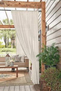 Elegant white drapes on an outdoor patio birmingham al